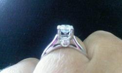 Engagement ring is 14 kt white gold 1 karat with two small diamonds on each side. the band is 14 kt white gold with half a karat engagement ring replacement value is $4500 an the band is $1000.00 will sell for $2500 OBO.
 
Barely worn has lifetime