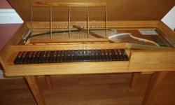 This Antique 1967 Clavichord was built by Sabathil & Son, Dolce model, 49yr old teak wood finish in fair condition, all original. Great 'warm-up' instrument, original bill-of-sale available.