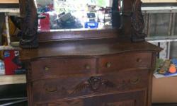 Beautiful Antique Cabinet. Storing it in our garage as there are no walls left for it in our house.