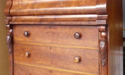 Antique  Mahogany Chest of Drawers from the Victorian era.
Dove tail joints, 2 bow fronted drawers, seperate base, drawer partitions, carved risers, etc.... We are open to reasonable offers!
48" wide x 53" high x 22" deep.
