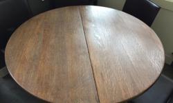 Nice antique wood dining table and 4 leatherette chairs. Sold together only. Table can expand to seat 6