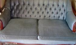 For Sale a steel blue loveseat, no rips or tears.  If this ad is still on site then it is still available. Thanks
