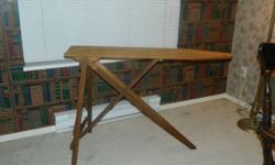 Antique folding wooden ironing board, good condition.