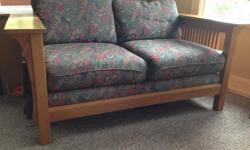 Solid Oak love seat ... good condition! Located up island so you would need to be able to pick it up!