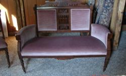 We have an autique settee and chair for sale .It was professionally  recovered in 1970 ,and was never used (are family home look don`t sit ) It has no mark`s or stains (covered)  Asking 375.00