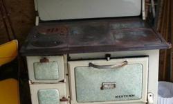 Have a nice old stove-enamel- rusted inside but looks great-only 95.00