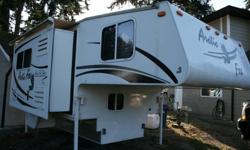 Top of the line camper for short box trucks. Slide out side makes for huge room inside. Electric jacks with remote. Three way Fridge/freezer. Propane Stove/oven, microwave, furnace, wet head with shower, north/south queen size bed and fold down dinette.