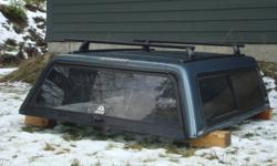 ARE Canopy purchased in March 2011.  Fit 2006 Chev Colorado truck.  Canopy has LED brake light, side sliding windows, and canopy lock, blue granite metallic factory paint match.  Original canopy receipt, $1682.  Current value of this canopy is estimated @