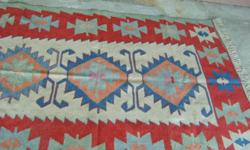 Area rugs, one 70?wide x 95? long, $75.00, and one 47? wide x 74? long, $50.00 or $100 for the pair.  Call 250-753-4412 to view.