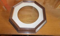 Art frame has a 7 1/4" round matte and is solid wood frame in a medium oak finish. Perfect for the budding artist in the family to fill with their work. Asking $10 contact 250-475-2291