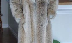 I have a full length 42inch Artic Wolf fur coat for sale.  Excellent condition.  Size 8-10 (roomy) could wear a sweater.  New lining put in.  Wore coat through winter then put in storage.  Asking price $800.00 o.b.o.