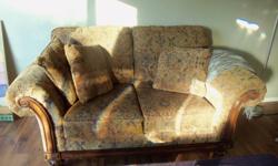 ASHLEY LOVE SEAT ,YES STILL AVAILABLE OFFERED FOR SALE 250. OBO PLEASE CALL JAN AT 718-0049 THIS IS A VERY COMFORTABLE LOVE SEAT IT IS CLEAN AND THE FABRIC IN EXCELLENT CONDITION ,minor scuffs on the wood work. FIVE PILLOWS INCLUDED with or with out the