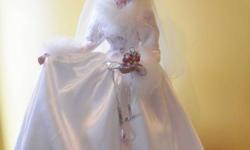 For Sale..Ashton Drake Bride Dolls...There is one for every season except for Summer...Each dolls comes with its own wedding bouquet..They are from a smoke free home and have been well taken care of. Each doll retailed for $250.00 plus the shipping...I
