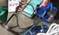 Horse size leather halter - barely used
Ribbon crop
Cotton lead line - used once
New lunge line, never unwrapped
Lettia polo bandages in package - used once
small grooming caddy with tools
horse book/magazine
Take all together for $75, OBO individually