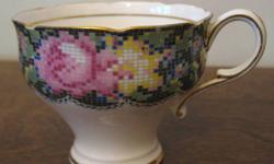 Patterns available:
GINGHAM ROSE demi-tasse cup. $10
GOLDEN EMBLEM (CREAM) demi-tasse cup. $10
pale aqua with blue & white flowers cup. $10
pale peach with yellow & pink chrysanthemums cup. $10
All 4 have the "By Appointment to HM The Queen & HM Queen