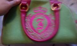 100% percent authentic adorable Juicy Couture purse. Contact me asap with your offer price. Do not forget how much they retail for. I am willing to negotiate :)