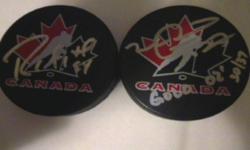 Great memorabilia representing your country and your favorite sport.
 
Autographed Mike Peca Team Canada "Gold 02" Puck #30 of 37
Autographed Ryan Smyth Team Canada Puck
 
Both come with certificates of authenticity from Channel Sports Inc.
 
Make me an