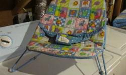 Baby bouncy chair... fair condition - $5.  Check out my other items listed!
