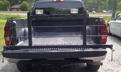 I have a back rack in excellent condition. Will fit almost any full size truck. With lights. $175