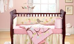 4 piece Crib Bedding set. Includes dust ruffle, fitted sheet, bumper and quilt. Very cute. I bought this one then fell in love with another one