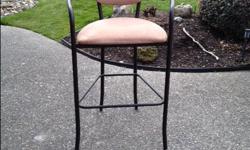 Bar stool with back and arm rests. Upholstered in beige microfibre material. No rips or tears. Excellent condition.