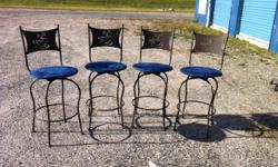 Four custom made bar stools with high back swivel seats covered in royal blue suede. Coffee cup design on chair back. Seat height 26 inches. Excellent shape...no stains...no damage. Purchased for $600.