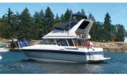 This sedan with a command bridge is absolutely priced to sell.Boat house kept. This model features forward and mid-cabin staterooms with upper and lower helms and is kept in a boathouse. With only 1255 engine hours on the twin OMC mod. Cobra sterndrives