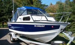 2002 Starcraft Islander.135hp I/O. Brand New Engine,0 hrs.18mnth wrnty. Boat is immaculate.
- galvanized trailer wih surge brks.,15hp4strk merc kicker,lowrance lcx 18c with GPS,cannon speed temp,brand new top, side curtins, and back enclosure.2 big jon