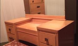 Includes tall dresser; vanity with bench/mirror; headboard/footboard with frame/slats for double mattress; nightstand.