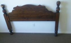 THIS BEAUTIFUL QUEEN SIZE SOLID DARK OAK HEAD BOARD IS IN VERY GOOD CONDITION/AND HAS A VERY RICH LOOK ABOUT IT/ALL YOU NEED IS YOUR BED FRAME TO COMPLETE/PLEASE PHONE 250-741-7777 THANKS.