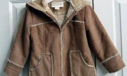 Beige longer coat with fake fur inside in excellent condition. Was rarely worn by my daughter before she outgrew it. Size 5 and from Bonnie Togs. Located near Ira Needles Blvd and Victoria St. South in Kitchener, and from a smoke-free home.