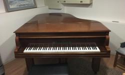 Beautiful full size grand piano.
Gorgeous tone and wood color
Made by Wilhelm Menzel
4900$ O.B.O
