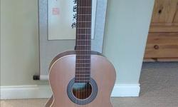 This beautiful Canadian made classical guitar is in perfect as new condition.
I purchased it on impulse, but due to arthritis have probably only played it for about 30 minutes in total.
As a professional musician (percussionist), I can testify it has a