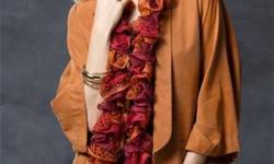 Christmas is quickly approaching! Are you at a loss as to what to get for mom or sister, cousin, or that great friend? Take a look at these gorgeous hand knit ruffled scarves. Fresh and feminine, with a flair of modern style. The subtle hint of silver