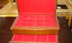 This attractive wooden jewelry box will make a great gift.  As pictured. Open to offers...