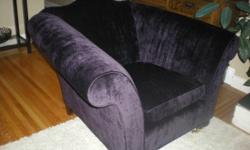 Beautiful deep purple velvet armchair that is SO comfortable to curl up in. It is in excellent shape and quality with brass wheels on the front and comes with a custom-made pale beige slip cover. From an animal and smoke free home. Measures 47"wide x