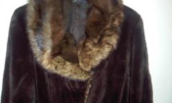 I'm selling a gorgeous beaver coat with a sable collar. It's a size 8. I wore it a few times but unfortunately it's too big for me. . it's in new condition. It's worth over $4000. I'm willing to consider any reasonable offer.