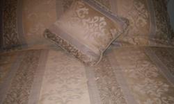FOR SALE..Queen size bedspread, bedskirt, 2 pillow shams and a decorator pillow.gold colour..in excellent condition  $45.00 for the set. obo