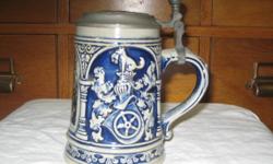 German beer steins-pewter lids. $40.00 each or all 4 for $140.00.
Man on horse slaying stag; blue & white Cotz V. Berlichingen; flowers; man on horse with dogs and stag & man with spear.