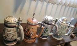 BEER  STEINS....Collectables
  Complete  set..starting  with 1977......  through  YR 2000
   Avon...German  Stoneware....Total of  32  STEINS...
  Excellent  shape....Including  Mellennium  ..Sports..
Hunters...Wild  West..and  many  more
 
 Would  prefer