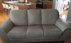 Almost new (7 months old) - beige leather sofa - in excellent condition.