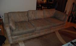 Used sofa for sell. Beige with blue and pink thread work. Still in good condition. From a pet-free home. Only $40