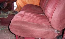a red chevy1/2 ton bench seat ,from an 1988 reg cab ,a good vacuuming and they are good to go ,offers