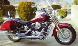 2003 Kawasaki Vulcan 800 cc Classic, Beautiful Bike, Dark Cherry Red, Cromed out and Completely Finished with all Vulcan brand name accesories.  Excellent Condition.  Must be seen.  Great for highway and in town.