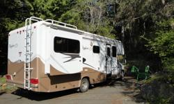 do you want to upgrade or downgrade with this barely used motorhome?
ford engine, back up camera, generator, hitch, entertainment center, seperate shower, 3 burner stove, oven, micro wave, frig freezer, queen bed, tons of storage, 3 way power,2 slides,