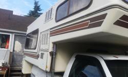 For sale is my 1986 Bigfoot 9'6" camper. Comfortable unit with 4 burner stove/ oven, bathroom with shower etc. Hi Jacker hydraulic jacks work well. Fridge just quit and floor is soft at very back. Price is negotiable. Currently sitting on a 1996 chevy