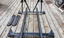 Selling a roof-rack package.
Have a bike rack and a Thule ski rack for mounting on a Nissan Pathfinder.
This would fit virtually any Pathfinder or Infinity QX4 from 1998 to 2006.
May even fit other makes/models - seems like a pretty standard roof-rack