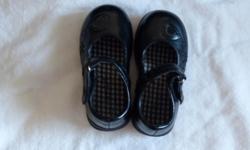 Size 7 toddler, Velcro strap, in very good condition.