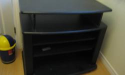 Black entertainment unit. Should be able to fit a TV up to 36", a CRT or flat screen. There is a minor scratch at top left corner.
Pick up in North Vancouver.