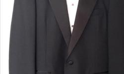 Black tuxedo size 40 regular.
White tux shirt inluded, neck size is 15 1/2.
$55